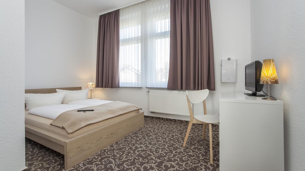 Pension Lok-Inn Walluf Quarto foto